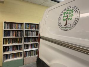 rotation van and boxes of books in SEKLS garage